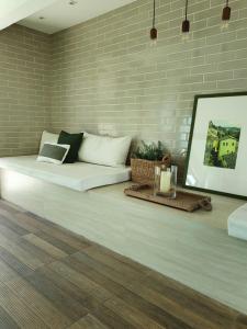 Encantador apê com 2 suítes的休息区