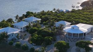 an aerial view of a resort on the water at Kalopsia Seaside Villas & Marina in Great Guana Cay