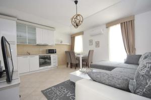 Kuchyň nebo kuchyňský kout v ubytování Seaside Apartments Petrovac