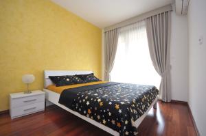 Postel nebo postele na pokoji v ubytování Seaside Apartments Petrovac