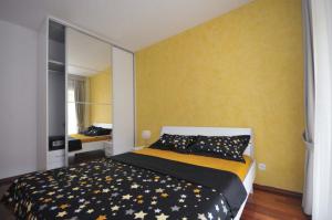 Postel nebo postele na pokoji v ubytování Seaside Apartments Petrovac