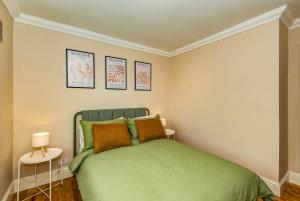 Ένα ή περισσότερα κρεβάτια σε δωμάτιο στο 3 bed home by the sea +8 φωτογραφίες