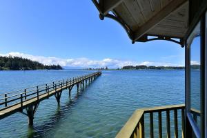 a bridge over a large body of water at Pacific Coast Beach House by EMR Vacation Rentals in Sooke