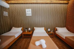 Postel nebo postele na pokoji v ubytování Borealis Guest House