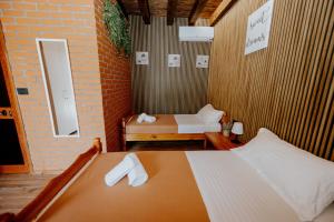 Postel nebo postele na pokoji v ubytování Borealis Guest House