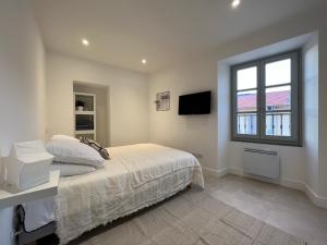 Posteľ alebo postele v izbe v ubytovaní PALM RIVIERA Capucins - Vieille ville de Menton - Vue mer
