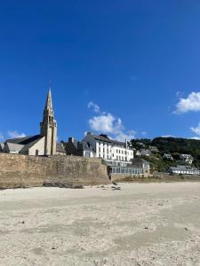 Fotografia z galérie ubytovania Maison bretonne à 2 mn à pied de la mer v destinácii Saint-Michel-en-Grève