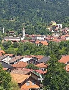a view of a town with houses and trees at Apartman hukanovic in Bosanska Krupa +11 photos