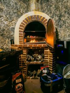 a brick oven with a fire inside of it at Hotel Boutique Casa Lanz XVII in Campeche +80 photos