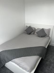 Ένα ή περισσότερα κρεβάτια σε δωμάτιο στο FoorYouhomes