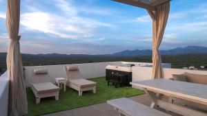 Nespecifikovaný výhled na hory nebo výhled na hory při pohledu z apartmánu