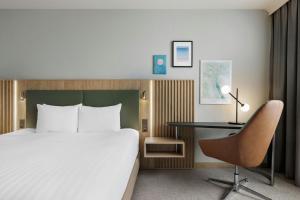 Letto o letti in una camera di Courtyard by Marriott Zurich North