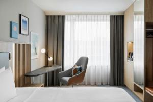 Letto o letti in una camera di Courtyard by Marriott Zurich North