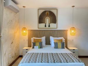 Postel nebo postele na pokoji v ubytování Charme Pousada Boutique & Spa
