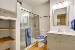 a bathroom with a shower and a toilet and a sink at Boat Lift and Private Dock Riverfront LaBelle Gem in La Belle +17 photos