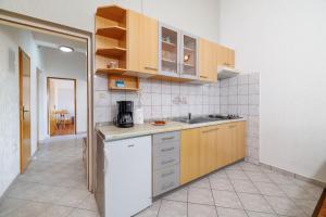 Kuchyň nebo kuchyňský kout v ubytování Apartments Krunoslav