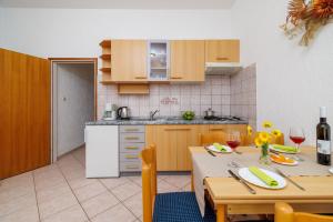 Kuchyň nebo kuchyňský kout v ubytování Apartments Krunoslav