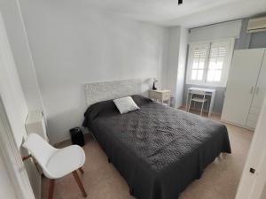 Ένα ή περισσότερα κρεβάτια σε δωμάτιο στο Salvy Home