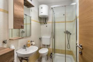 Koupelna v ubytování Apartment UGA