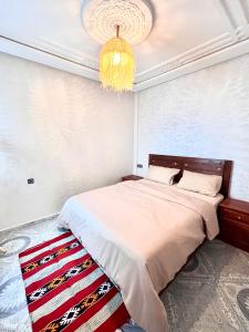 En eller flere senge i et værelse på Dar Itran Sunny Apartment near Taghazout