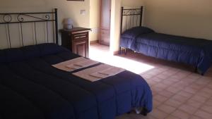A bed or beds in a room at Villa Rica