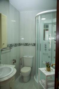 Kúpeľňa v ubytovaní Xavestre Rooms Santiago