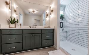 a bathroom with a sink and a shower at Farmhouse in the Burg in Gatlinburg +40 photos