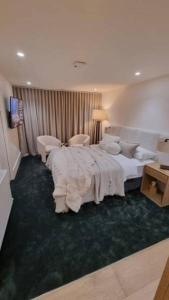 Ένα ή περισσότερα κρεβάτια σε δωμάτιο στο KOKI Apartment 4
