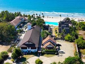 an aerial view of a resort with a beach at Playa Tropical Resort Hotel in Currimao
