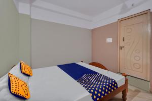 Foto Bangalore’is asuva majutusasutuse SPOT ON Canton Lodging And Boarding galeriist