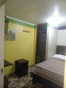 Postel nebo postele na pokoji v ubytování Waylla Hostel