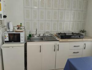 Una cocina o cocineta en Cabañas Económicas Temuco 5 fotos más