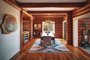 a dining room with a table and a kitchen at Japatul House w Pool & Spa 5 Star Google Reviews in Alpine