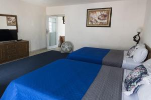 เตียงในห้องที่ Hotel Boutique Catalina's House +4 ภาพ