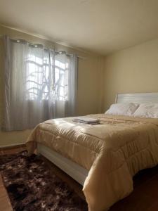 Katil atau katil-katil dalam bilik di Casa em Penedo