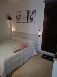Postel nebo postele na pokoji v ubytování Vimar + 4 fotografie