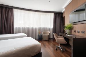 Posteľ alebo postele v izbe v ubytovaní Crowne Plaza Milan City by IHG
