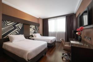 Posteľ alebo postele v izbe v ubytovaní Crowne Plaza Milan City by IHG