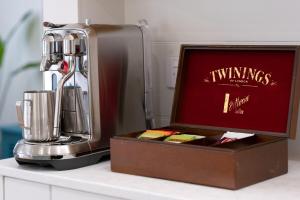 a kitchen appliance sitting on a counter next to a box at Sea Sage Cottage 4703 in Yeppoon