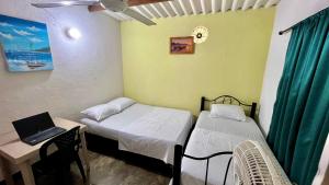 Postel nebo postele na pokoji v ubytování Habitación doble privada a 5 min del mar