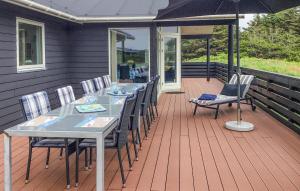 Balkón nebo terasa v ubytování Holiday Home Astavej Løkken I