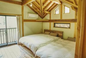 Postel nebo postele na pokoji v ubytování Keiryuso