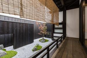 Fotografie z fotogalerie ubytování 京町家一棟貸しKyoto Machiya Stay En v Kjótu