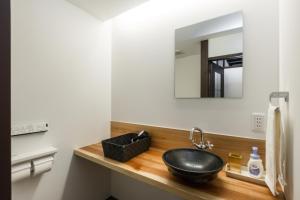 Koupelna v ubytování 京町家一棟貸しKyoto Machiya Stay En + 36 fotografií