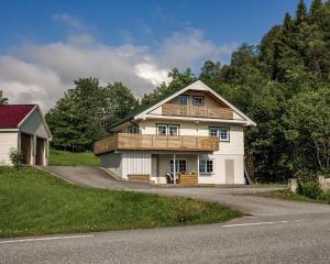 a house on the side of a road at Vestre apartment in Ålesund