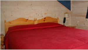 Lova arba lovos apgyvendinimo įstaigoje Chalet Valeruz