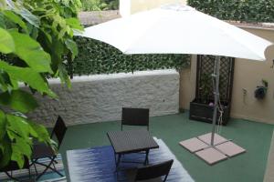 Patio alebo iná vonkajšia časť ubytovania B&B I Propilei di San Girolamo