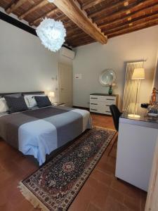 Postel nebo postele na pokoji v ubytování B&B Toringo