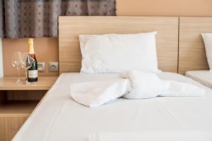 Posteľ alebo postele v izbe v ubytovaní Golden Sun Villas