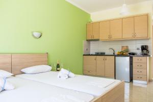 Kuchyňa alebo kuchynka v ubytovaní Golden Sun Villas